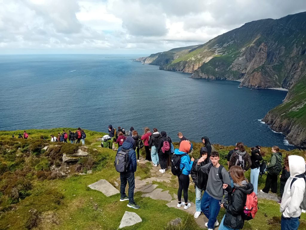 Students exploring the cliffs in Donegal