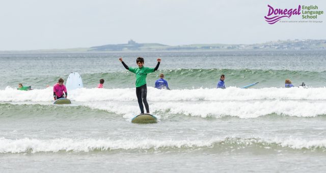 Student surfing in Donegal